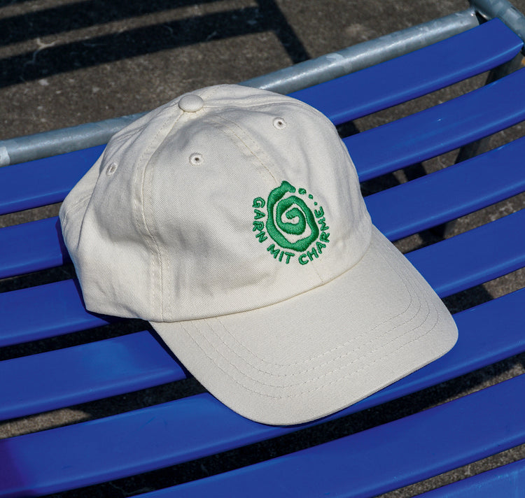 Filato con ciondolo - Berretto (beige)