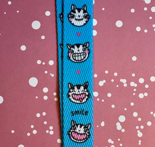 Taina - Schlüsselband "Smile" blue